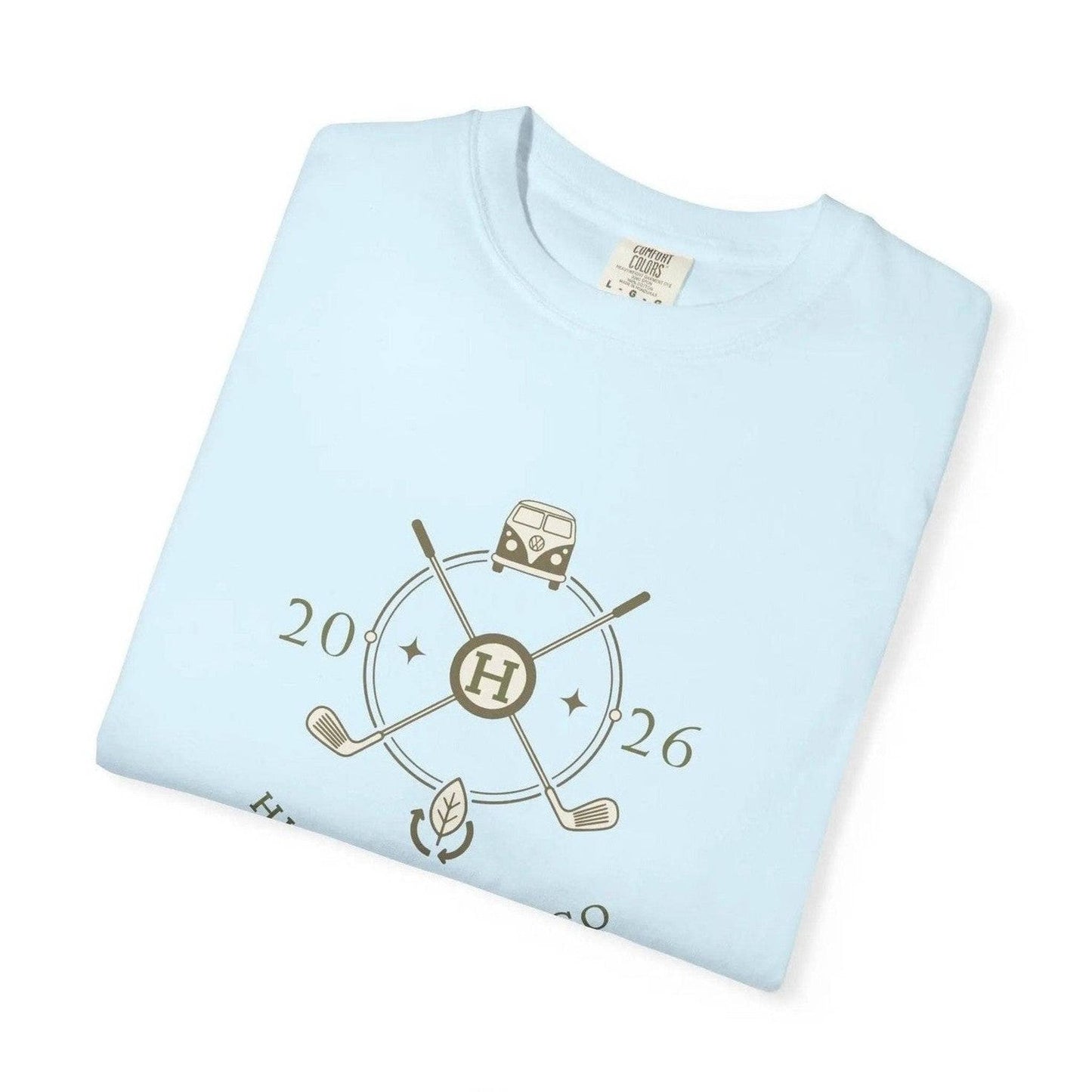 Folded light blue t-shirt showing Eco-Friendly Cotton tag and vintage van design