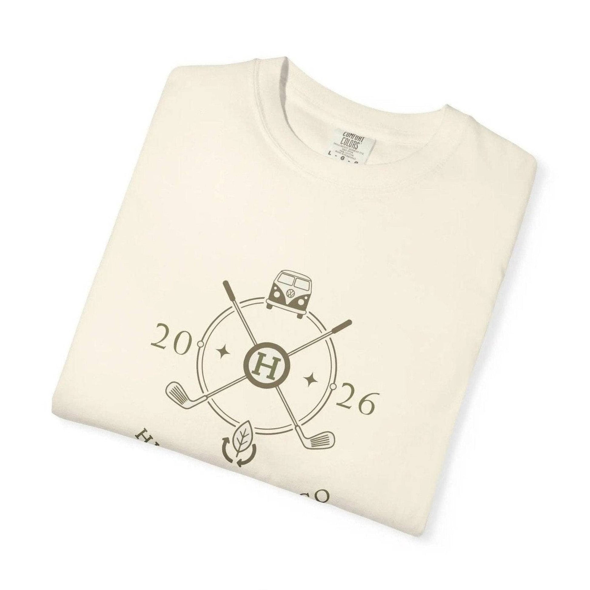 Off-white folded t-shirt with eco-friendly cotton tag and vintage van golf graphic