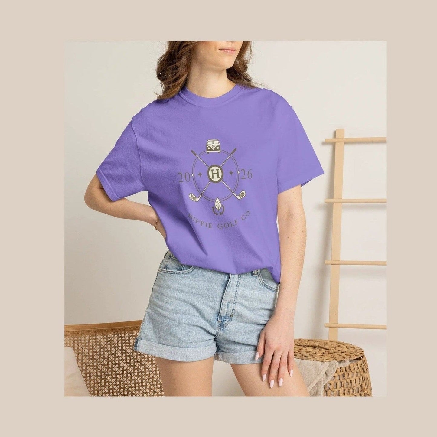 Lavender unisex t-shirt on model showing relaxed fit and vintage van logo