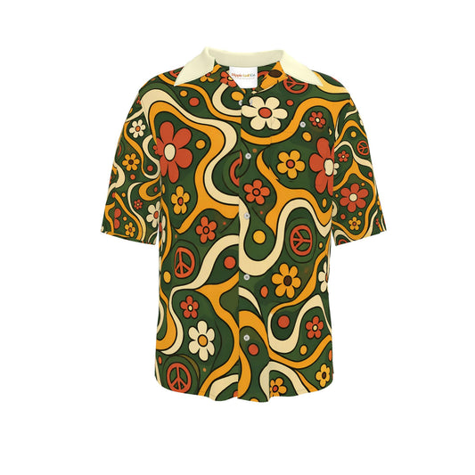 A short-sleeve button-up shirt with a bold mid-century modern geometric pattern in orange, yellow, white, and black, displayed on a clean white background.