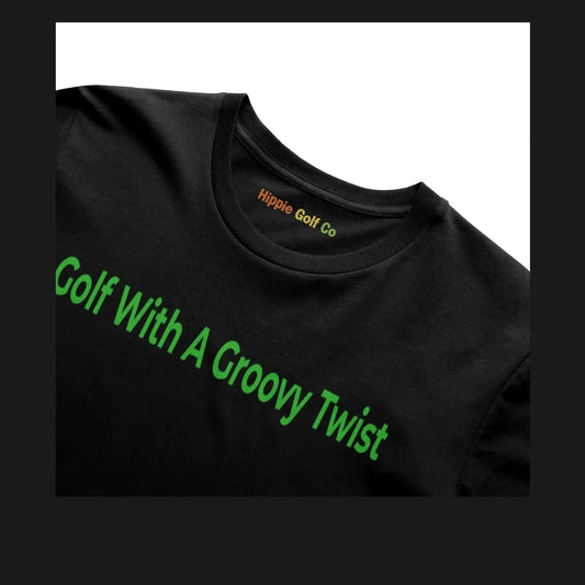 Black unisex t-shirt featuring diagonal green slogan text and multi-colored brand collar label