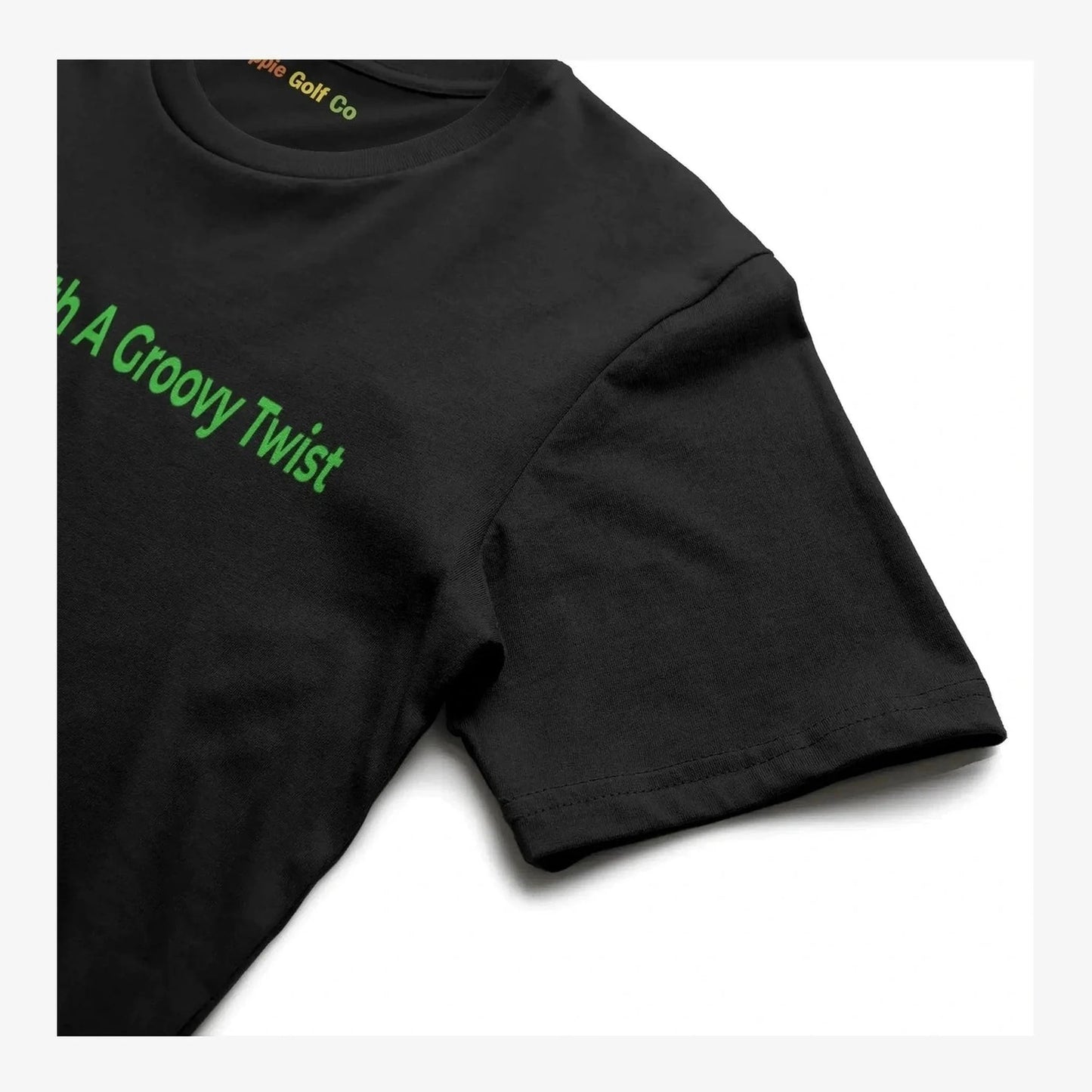 Black tee close-up highlighting smooth fabric texture and partial green slogan print