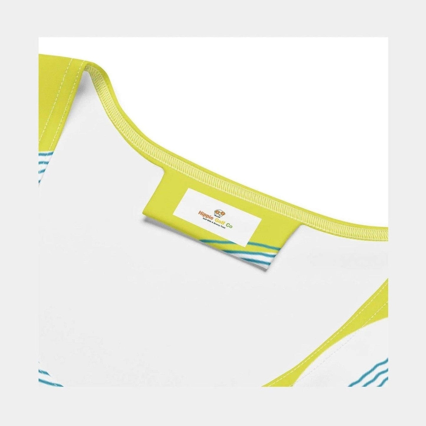 Close-up of Hippie Golf Co tag and yellow lining inside green dress
