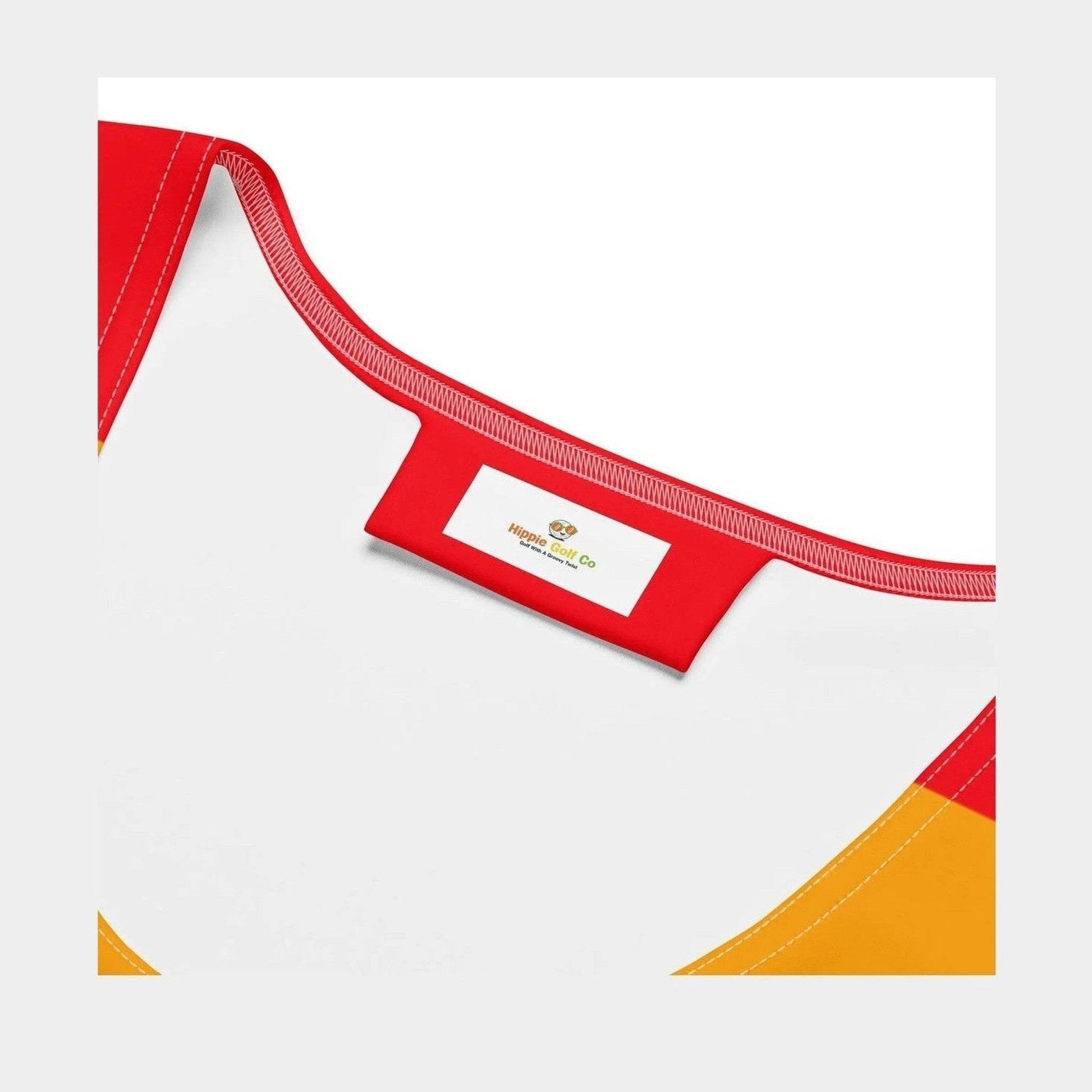 Close-up of Hippie Golf Co brand tag inside rainbow striped dress neckline