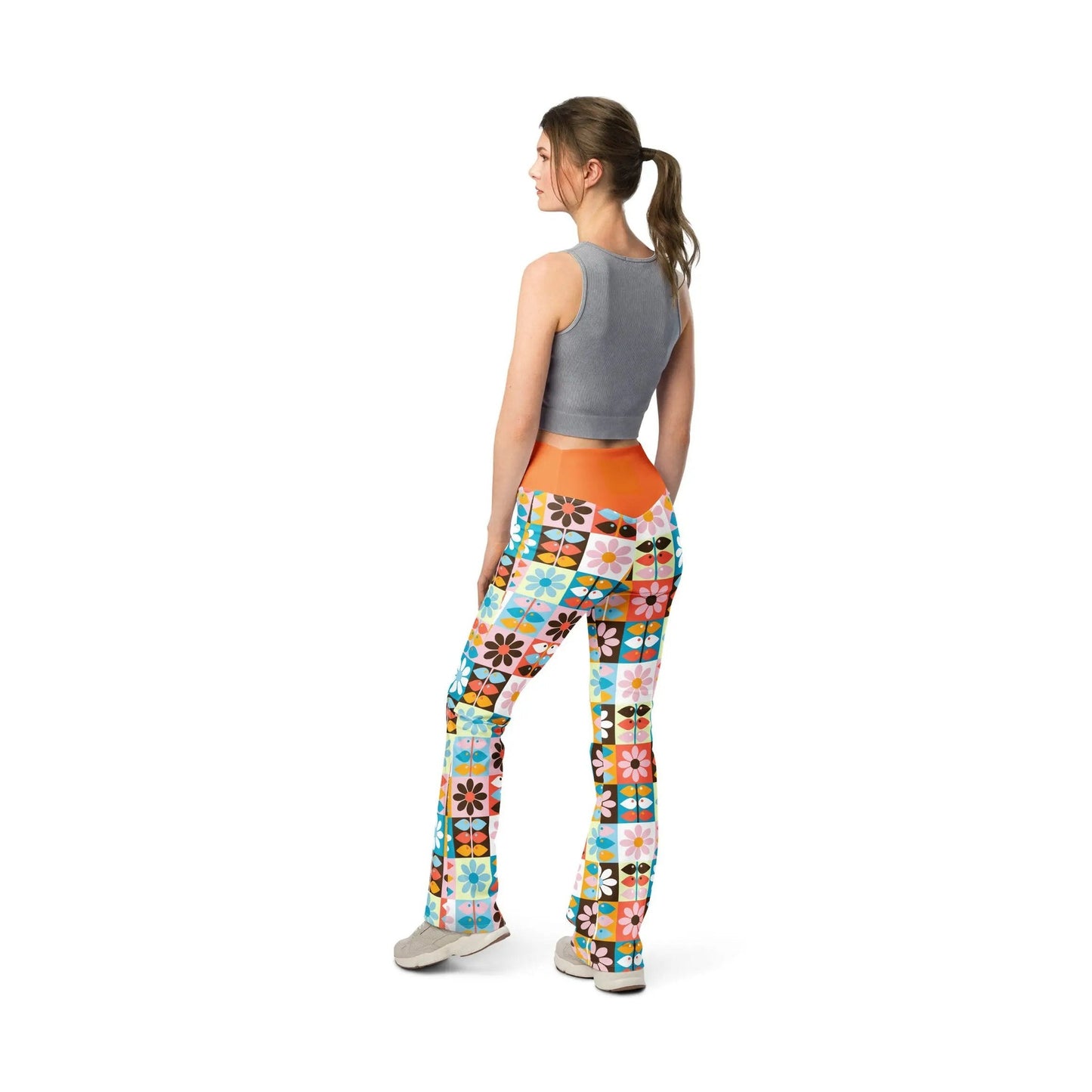 Wild Flare leggings with orange waistband and floral bird patchwork