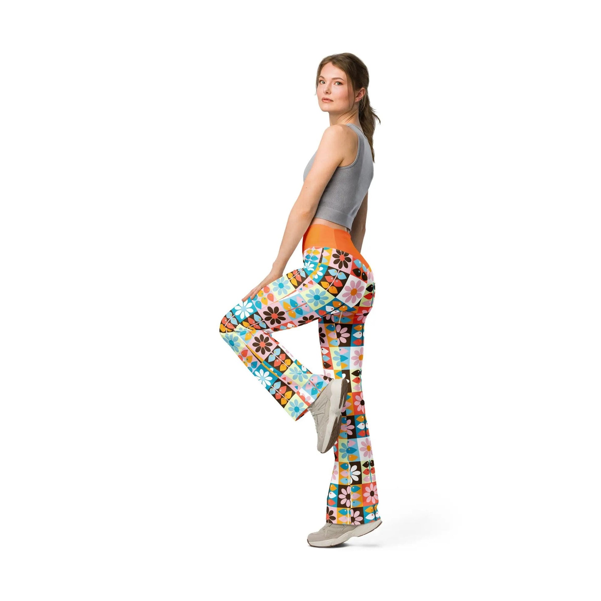 Woman modeling Wild Flare leggings with wide ankle flare