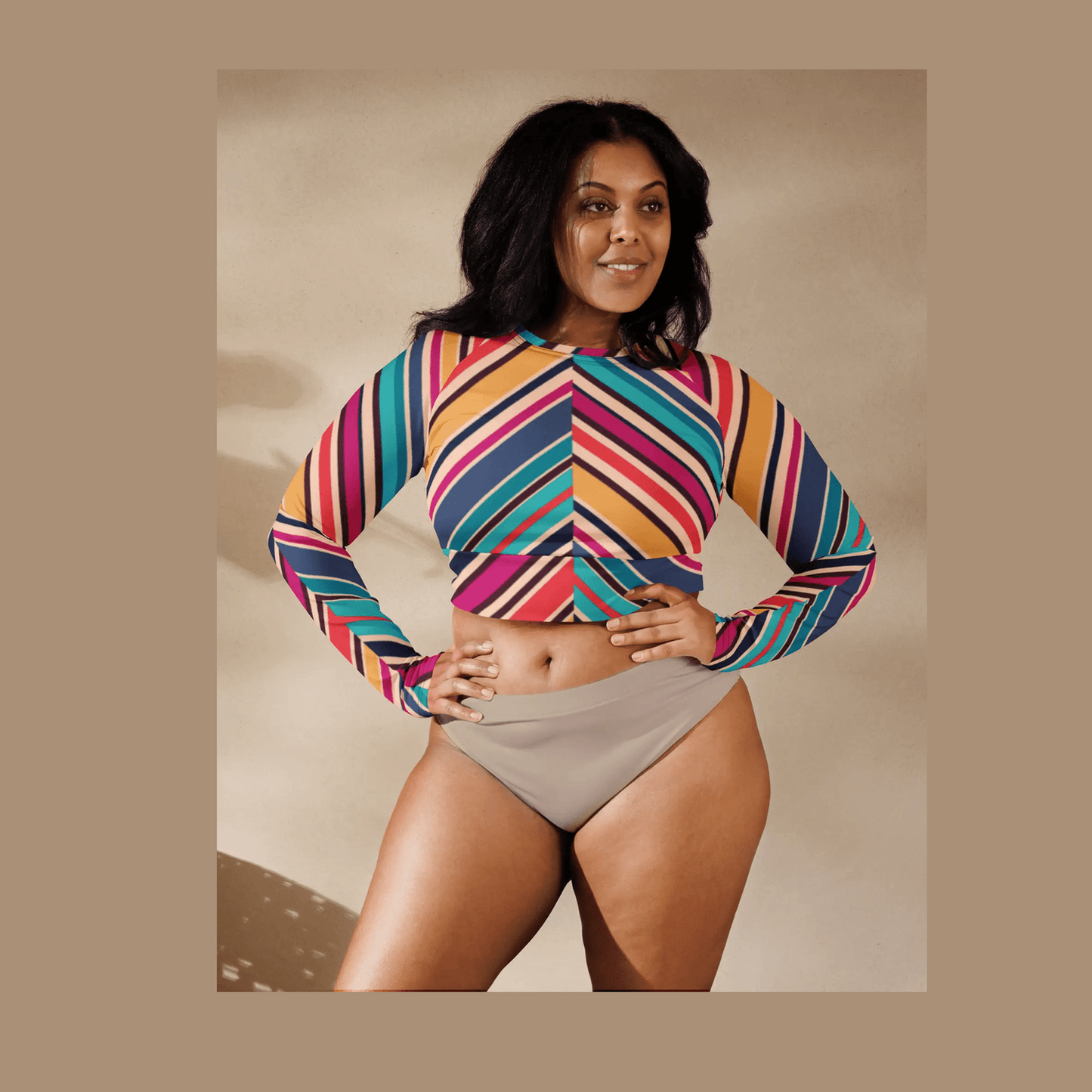 Recycled long-sleeve crop top with multicolor diagonal stripes and double-layer waistband