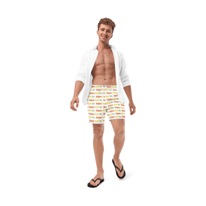 Men wearing white relaxed fit golf shorts with colorful logo print