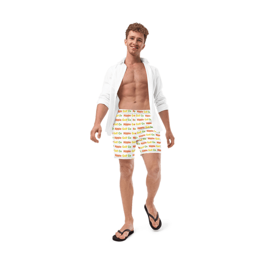 Men wearing white relaxed fit golf shorts with colorful logo print