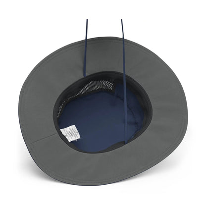 Overhead view of navy booney hat interior showing gray stitching, mesh crown, and care label