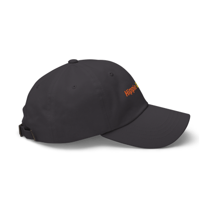 Dark gray dad hat side view showing adjustable strap closure